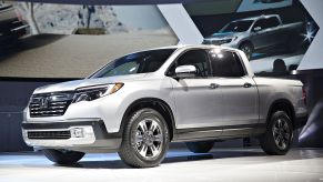 A Honda Ridgeline on display at an auto show.