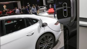 A concept electric vehicle from automaker Porsche is plugged in and charging at the 2017 New York International Auto Show