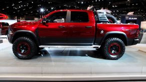 A Ram 1500 Rebel TRX on display at an auto show.