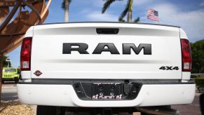 A white Ram diesel truck's tailgate.