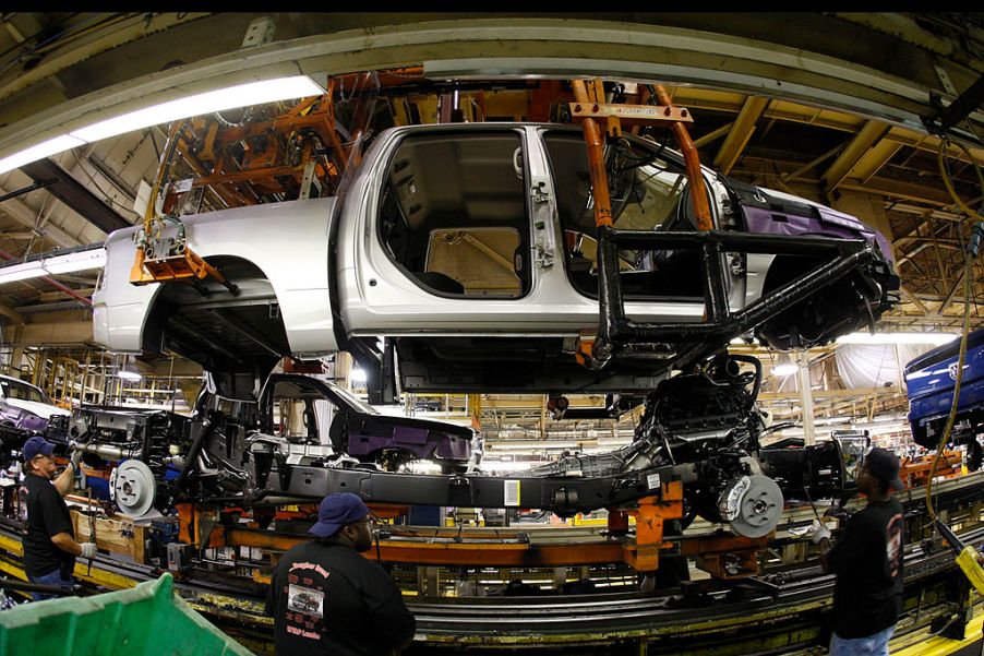 The body and chassis of a Ram pickup truck being assembled