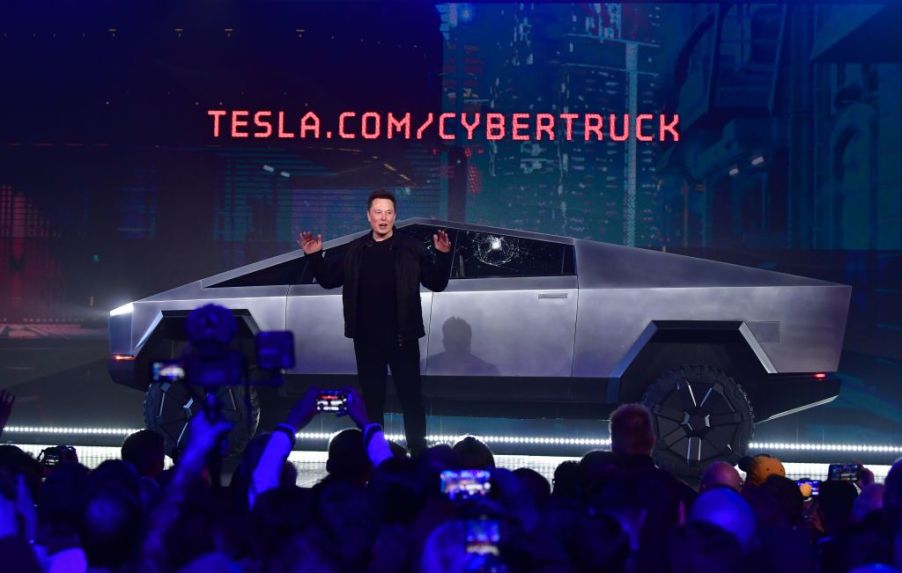 Tesla co-founder and CEO Elon Musk speaks in front of the newly unveiled all-electric battery-powered Tesla's Cybertruck