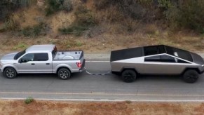 Tesla Cybertruck Ford F-150 towing tug-of-war