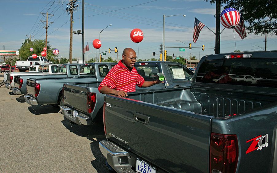 A car lot with used Chevrolet Colorado trucks