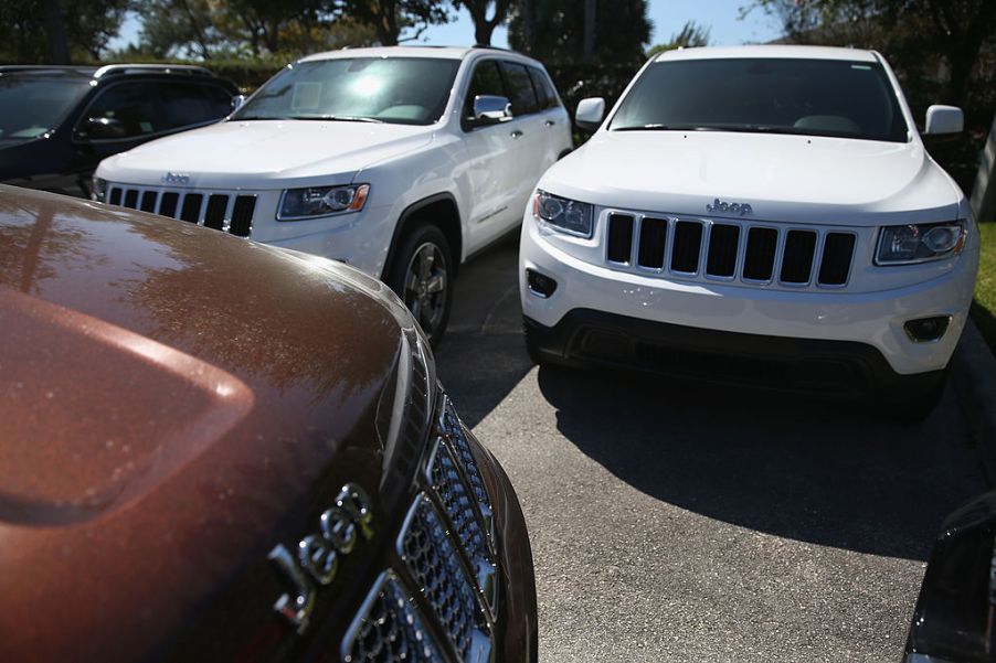 2014 Jeep Cherokees for sale at a car dealership