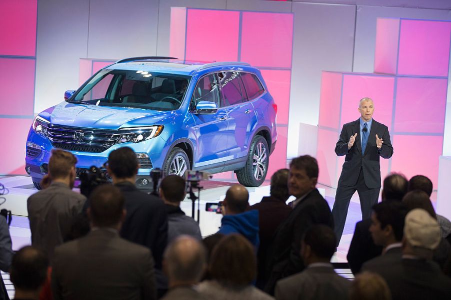 A 2016 Honda Pilot on display at an auto show