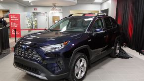 A 2019 Toyota RAV4 on display at a car dealership