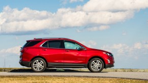 The 2020 Chevrolet Equinox drives along a road