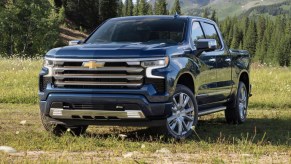 The 2023 Chevy Silverado parked in a field