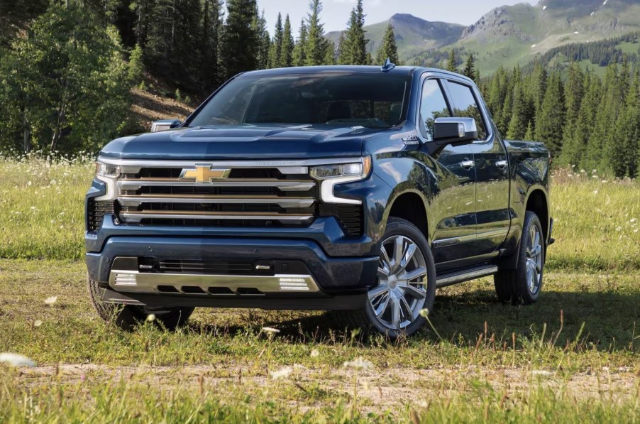 The 2023 Chevy Silverado parked in a field