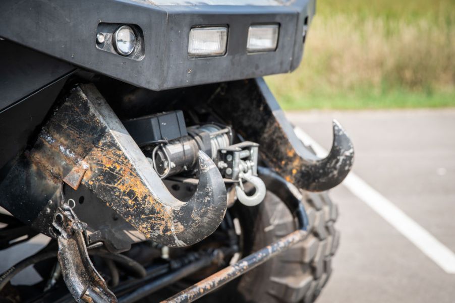 A winch can be seen attached to the front of a vehicle