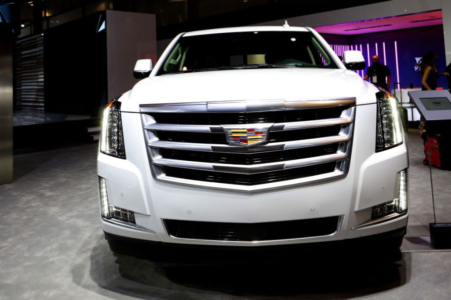 A Cadillac Escalade on display at an auto show