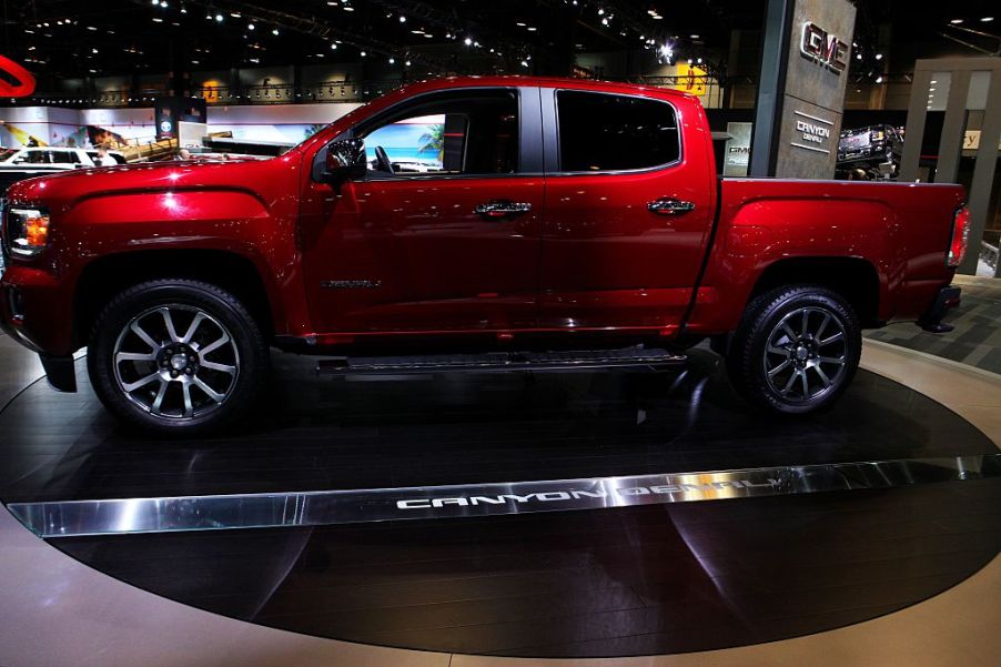 A GMC Canyon Denali on display at an auto show.