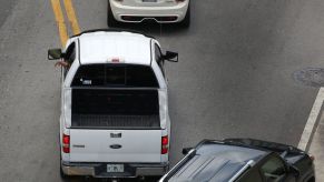 A Ford F-150 is stuck in traffic.