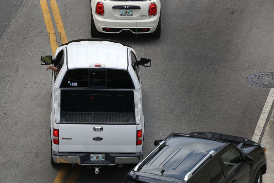 A Ford F-150 is stuck in traffic.