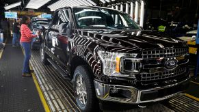 Ford F-150 trucks go through the customer acceptance line at the Ford Dearborn Truck Plant