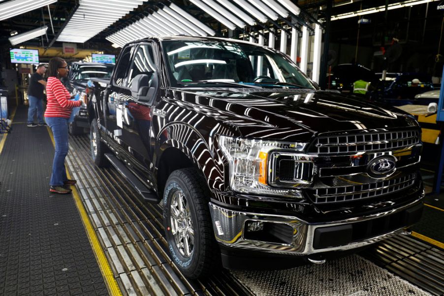 Ford F-150 trucks go through the customer acceptance line at the Ford Dearborn Truck Plant