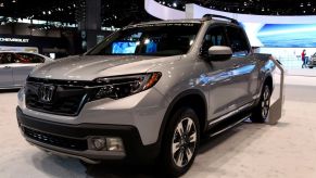 A Honda Ridgeline on display at an auto show.