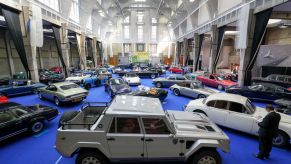 A Lamborghini LM02 truck on display at an auction house.