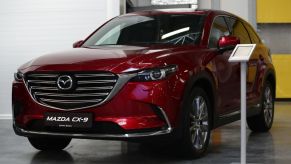 A Mazda CX-9 on display at an auto show.