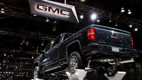 A GMC Sierra on display at an auto show.