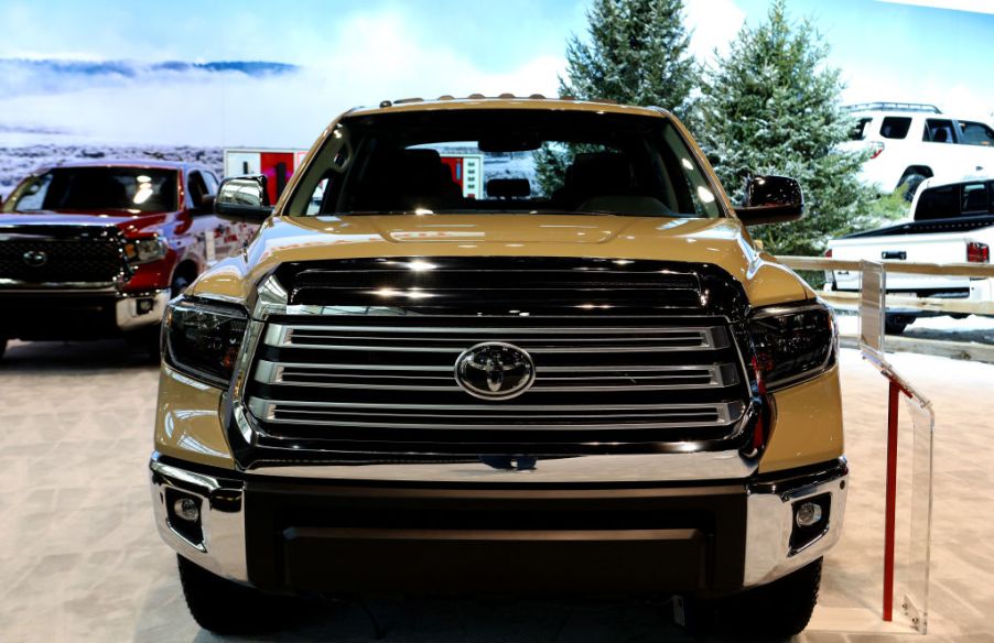 A Toyota Tundra pickup truck on display at an auto show.