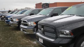 Ram 1500 diesel trucks for sale at a car lot.