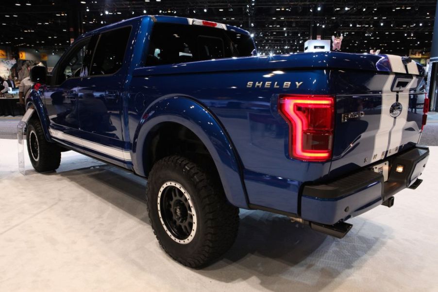 A Ford Shelby F-150 on display at an auto show.