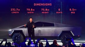 Elon Musk discusses vehicle dimensions at the unveiling of the new Tesla Cybertruck.