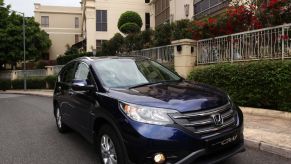 A 2015 Honda CR-V parked on the street