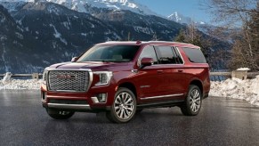 2021 GMC Yukon XL Denali parked on snowy mountain top