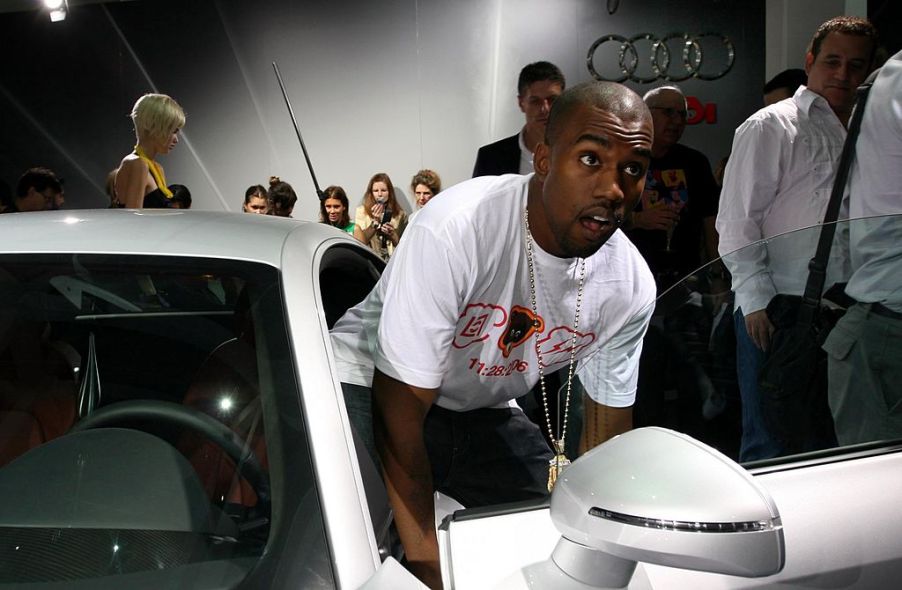 Kanye West steps into one of his cars