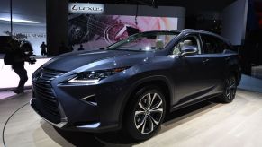 A Lexus RX on display at an auto show