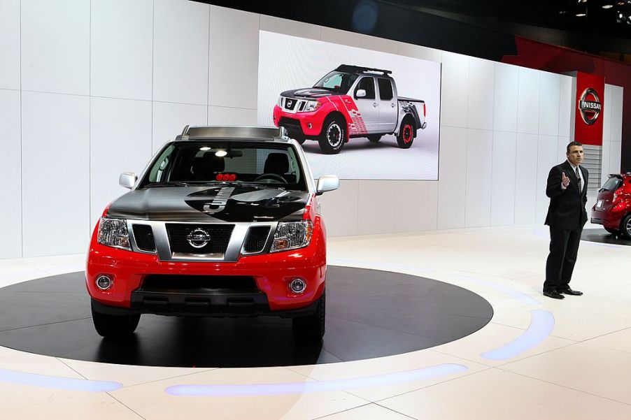 A Nissan Frontier new model being display at an auto show