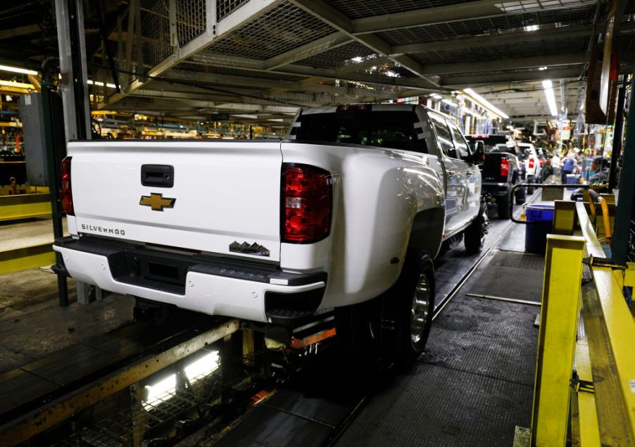 A Silverado with dual rear wheels being assembled