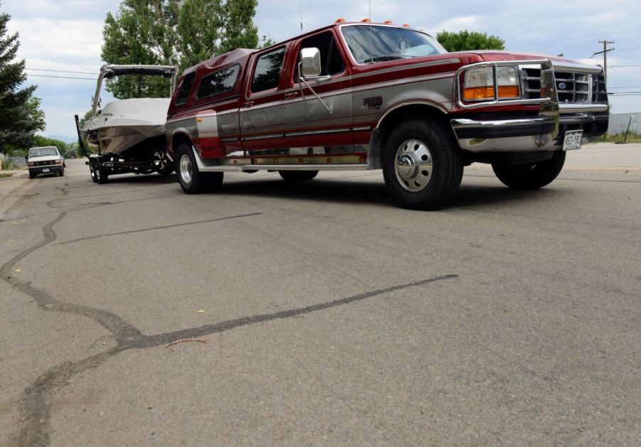 A pickup truck towing a boat