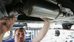 A car mechanic working on a car