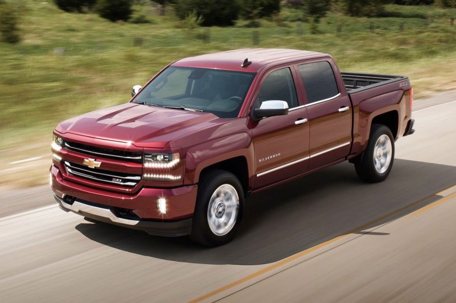 The 2016 Chevy Silverado driving down the road