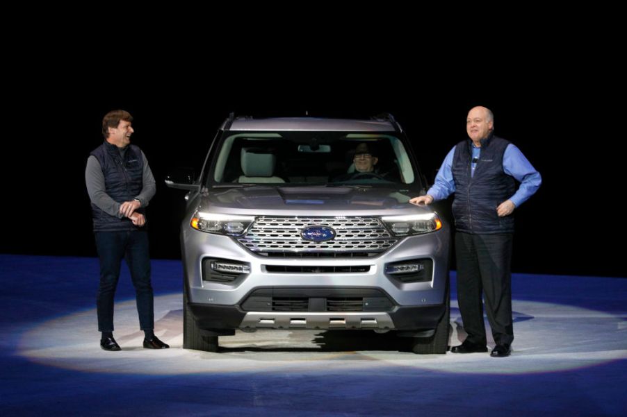 Jim Hackett (R), president and CEO of Ford Motor Company, and President of Global Operations Jim Farley speak at the reveal of the new 2020 Ford Explorer SUV at Ford Field