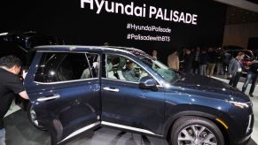 Attendees get a closer look at the 2020 Hyundai Palisade SUV after it was unveiled at AutoMobility LA