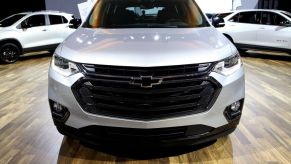 A Chevy Traverse SUV on display at an auto show