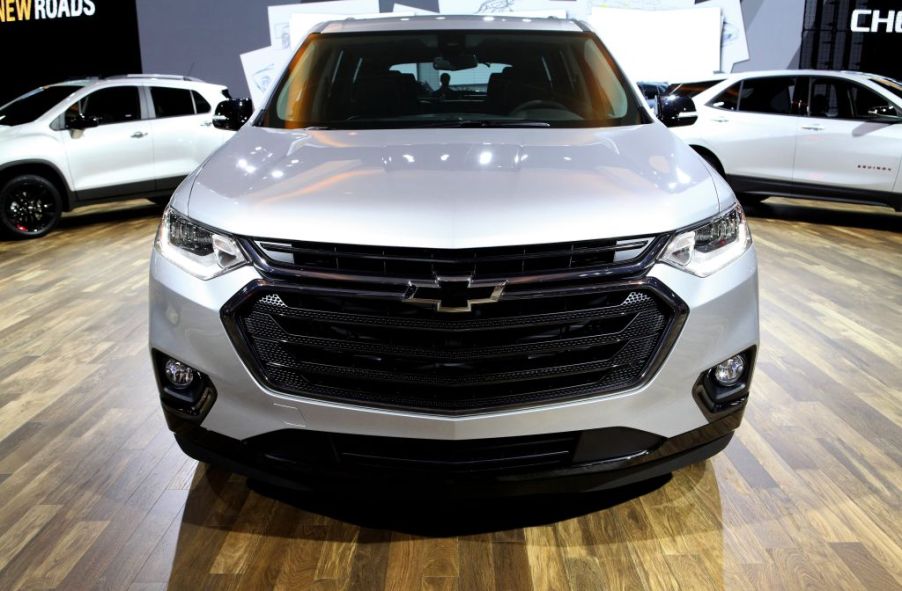 A Chevy Traverse SUV on display at an auto show