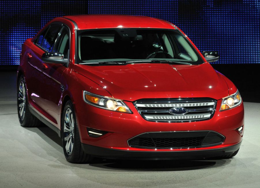 A Ford Taurus on display at an auto show