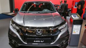 A grey Honda HR-V on display at an auto show