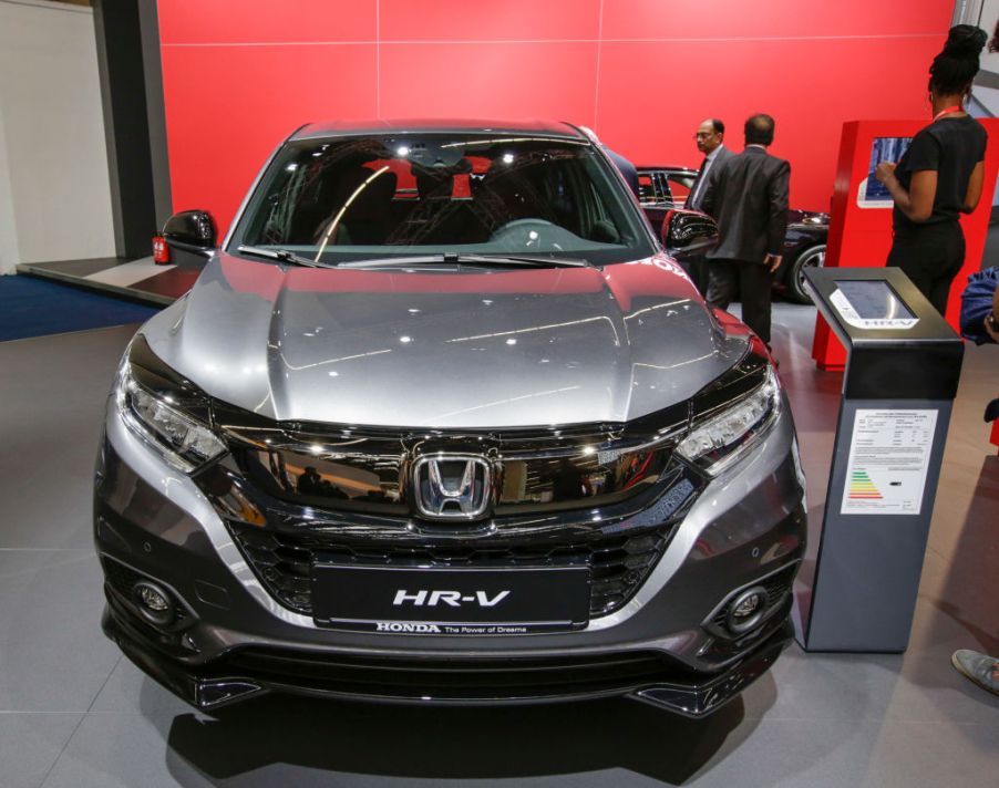 A grey Honda HR-V on display at an auto show