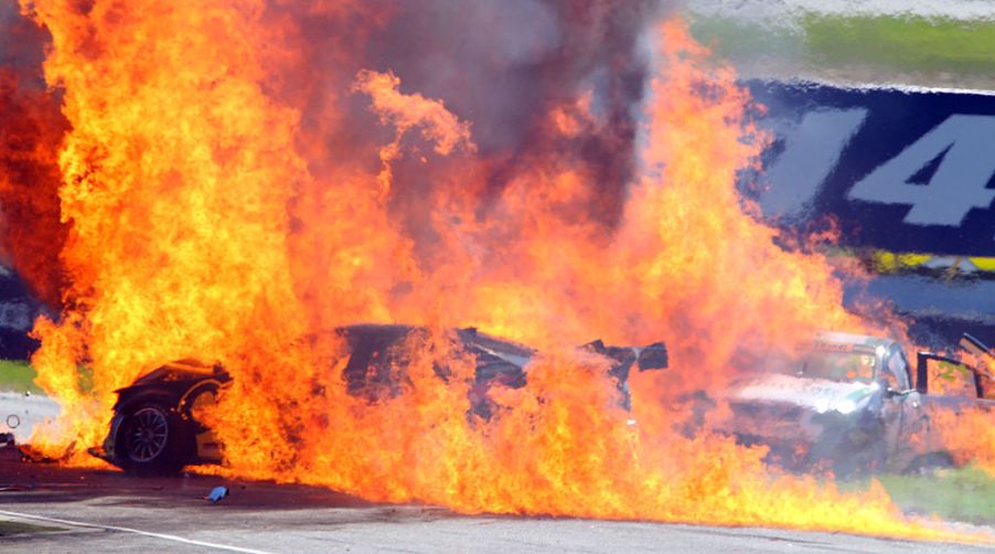 PERTH, AUSTRALIA - MAY 01: The race cars of Steve Owen and Karl Reindler are pictured on fire after a major crash on the start line in race 2 during the V8 Supercar round at Barbagallo Raceway on May 1, 2011 in Perth, Australia. (Photo by Paul Kane/Getty Images)