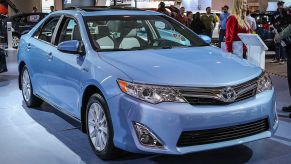 A Toyota Camry on display at an auto show