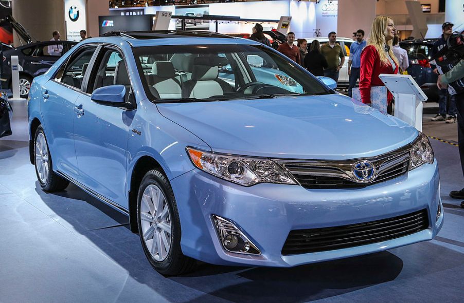 A Toyota Camry on display at an auto show