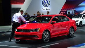 Volkswagen's 2015 Jetta TDI is cleaned while on display at the LA Auto Show's press and trade day in Los Angeles, California