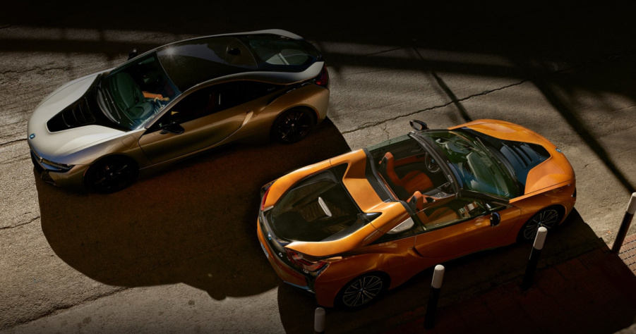 An image of two BMW i8's parked alongside one another.